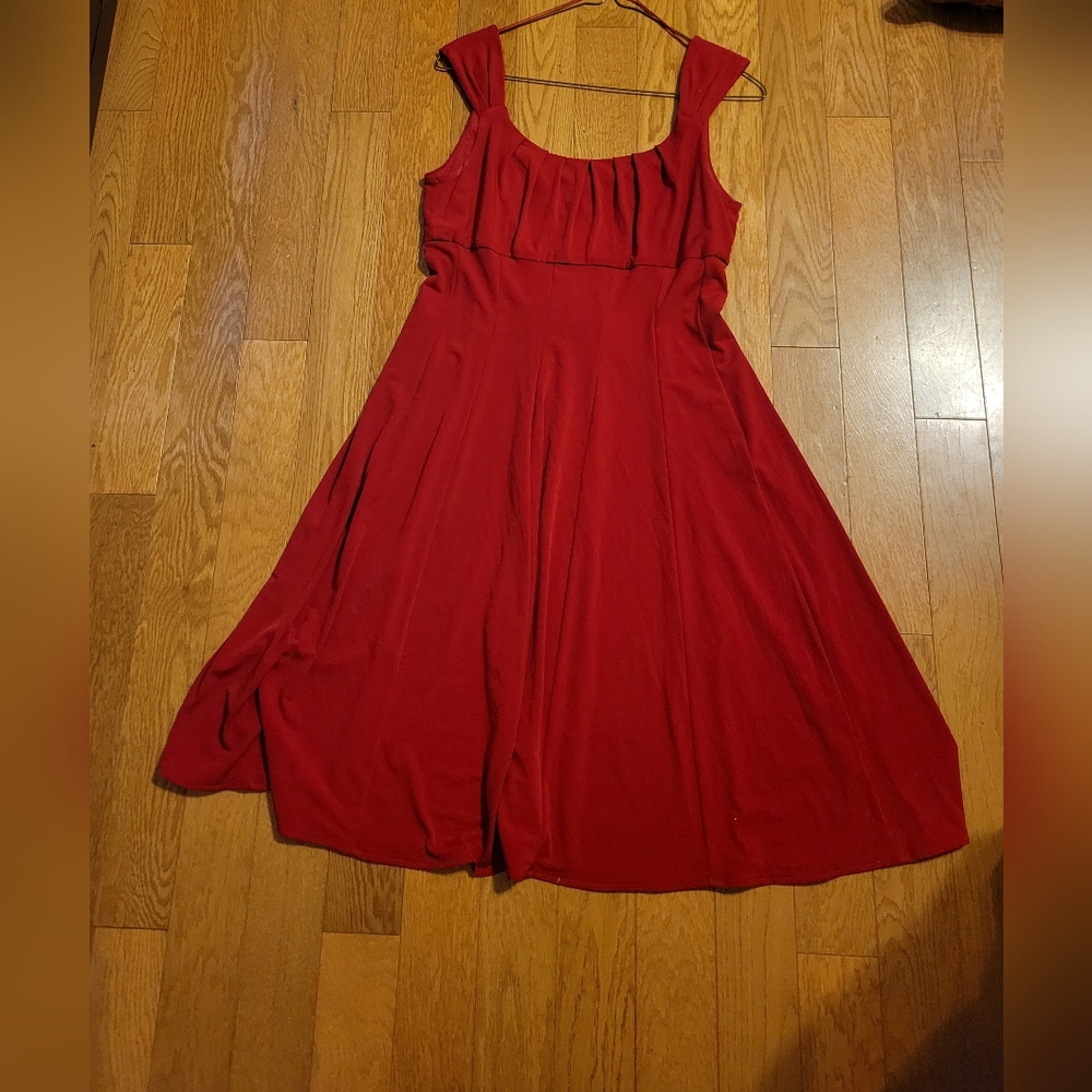 London Times red Dress. Fitted bust to accent cleavage and flare bottom